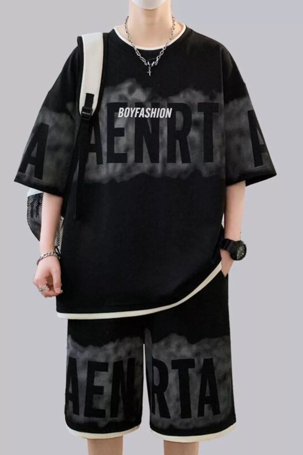 CLOTHRA men plus size oversized matching two piece t-shirt and shorts set showing a relaxed drop shoulder fit and urban streetwear style. in a color Black