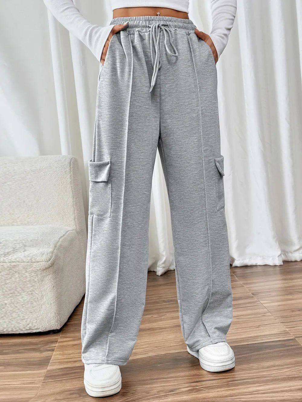 CLOTHRA Perfee cotton blend wide leg drawstring pants with pockets showing a relaxed baggy fluid drape in an authentic urban street look.