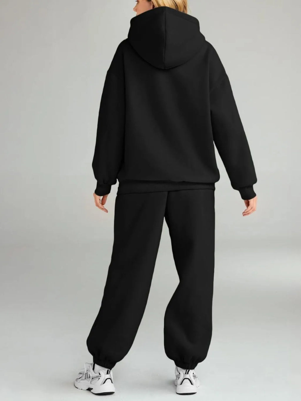 CLOTHRA plus size matching pullover hoodie with front kangaroo pocket and tapered joggers two piece sweatsuit tracksuit set in a clean urban look. Back side in a color Black 
