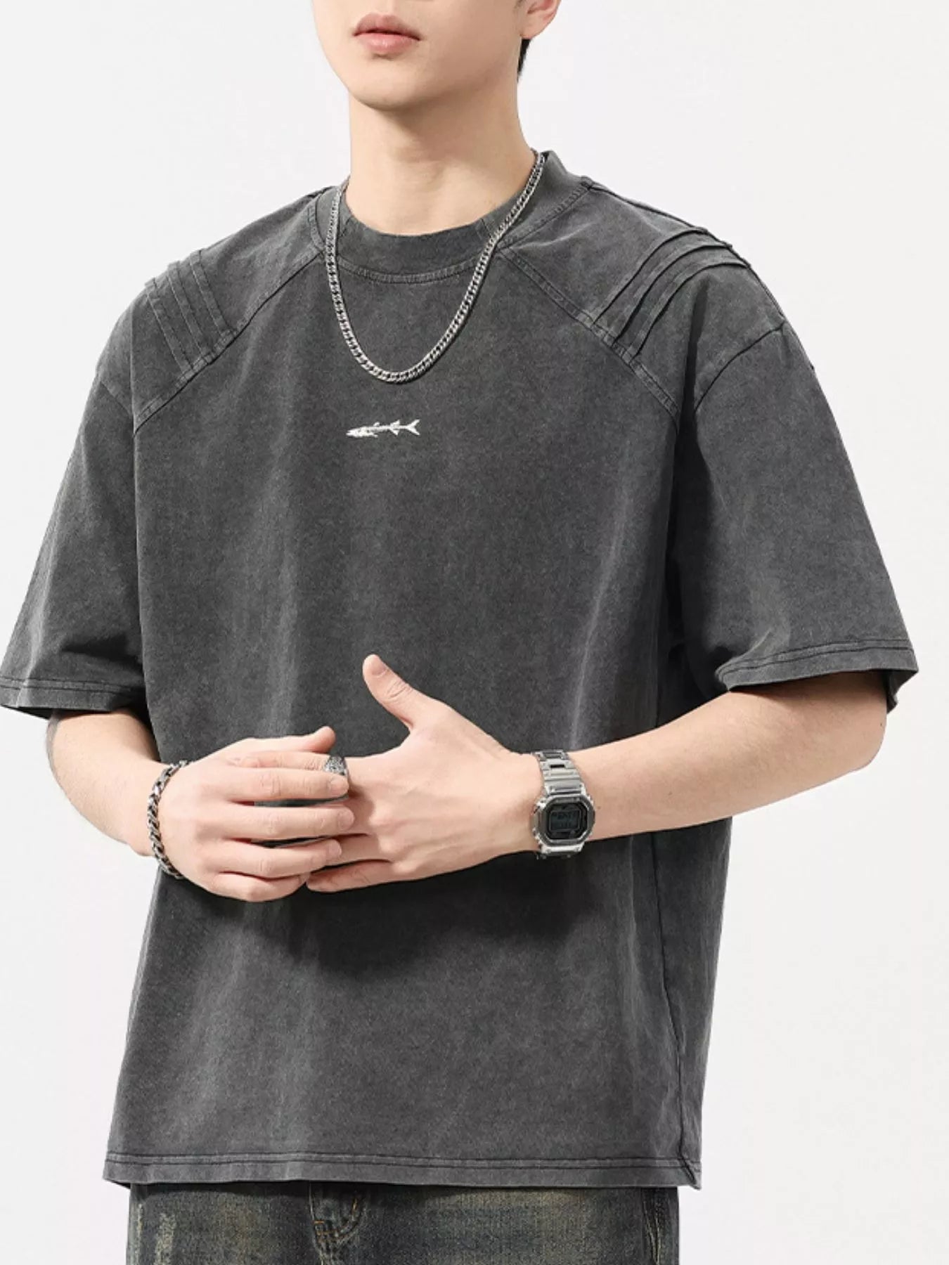 Close up of the reinforced anti sag round neck collar and flatlock shoulder stitching on CLOTHRA washed plus size t shirt. in a color Dark Grey