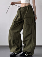 Close up of the heavy duty stitching and secure cargo pocket design on CLOTHRA street style pants.