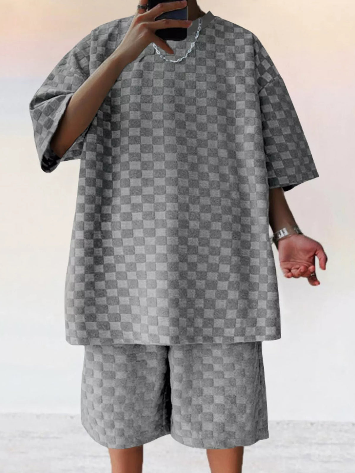 CLOTHRA men plus size matching two piece textured t-shirt and shorts set showing a structured boxy fit and premium casual resort style drape. in a color Dark Grey