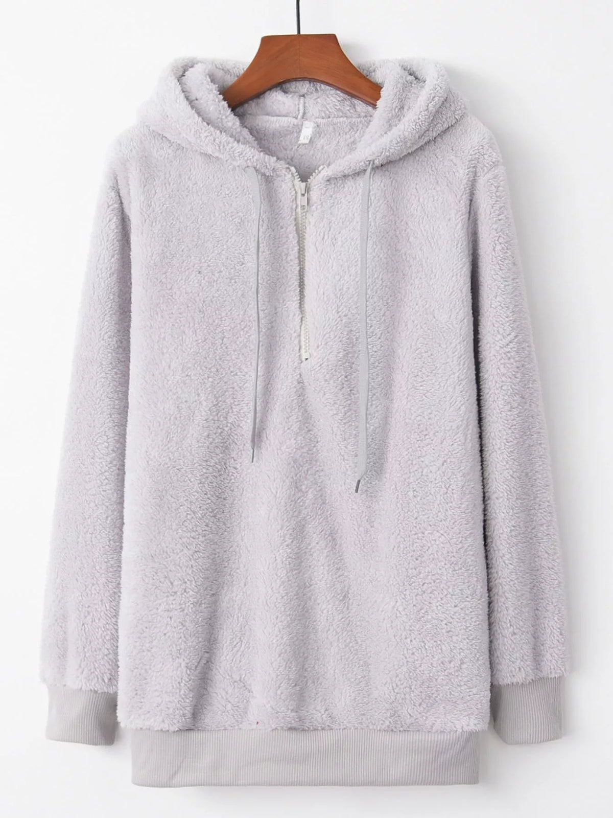 Close up of the high-quality front half zipper and thick adjustable hood drawstrings on CLOTHRA unisex fleece pullover. in a color Light Grey