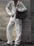 CLOTHRA matching full zip up outerwear jacket and cuffed joggers two piece tracksuit set in a clean urban look.