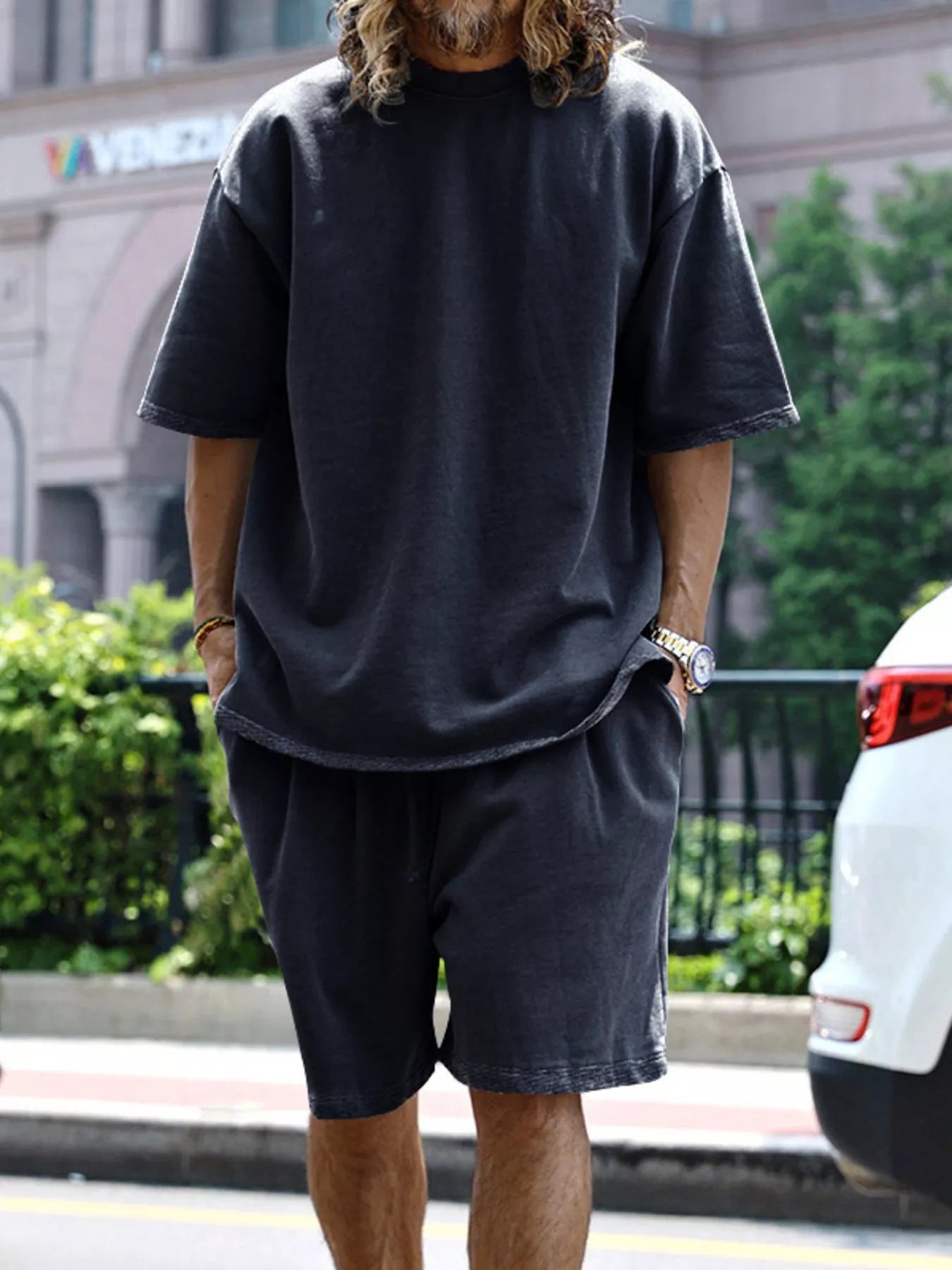 CLOTHRA men plus size matching two piece t-shirt and shorts set showing a relaxed modern casual fit and premium loungewear drape. in a color Black
