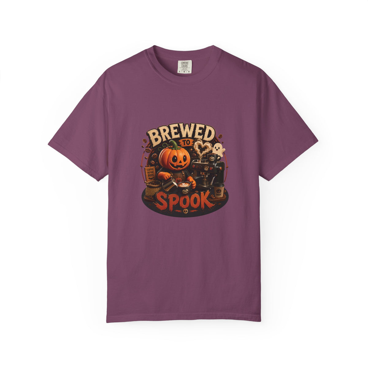 A purple short-sleeve crewneck t-shirt featuring a Halloween graphic on the chest with a jack-o'-lantern, a skeleton, a cauldron, and the text 'BREWED FOR SPOOK'.