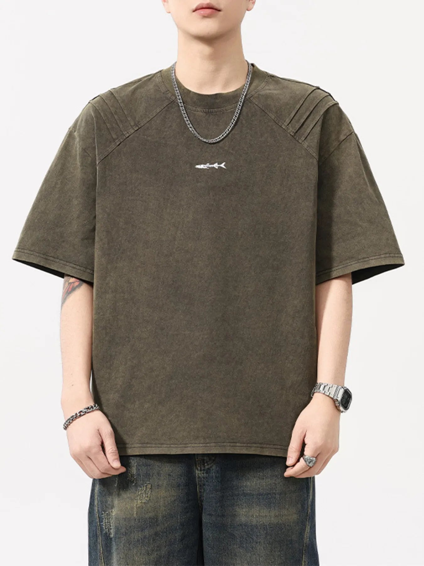 Close up of the reinforced anti sag round neck collar and flatlock shoulder stitching on CLOTHRA washed plus size t shirt. in a color Olive Brown