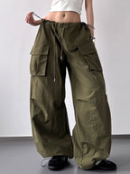 CLOTHRA baggy wide leg utility cargo pants with adjustable drawstring waist and deep multi pocket design.