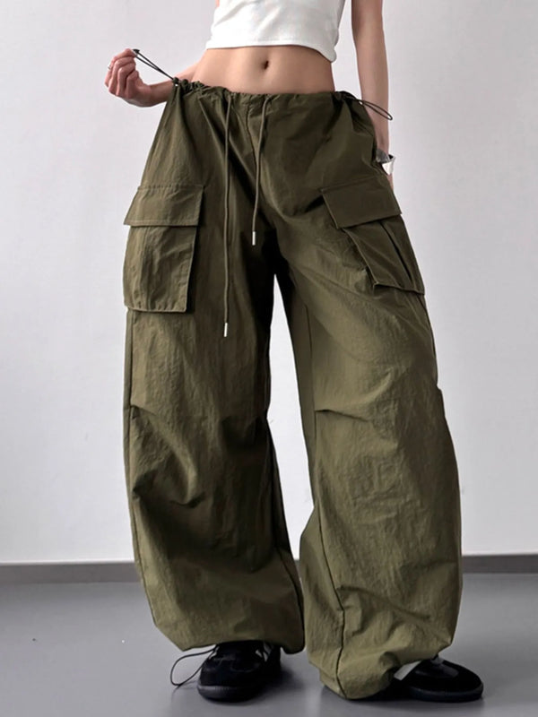 CLOTHRA baggy wide leg utility cargo pants with adjustable drawstring waist and deep multi pocket design.