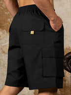 Detailed close up of the spacious side cargo pocket with durable double stitching on CLOTHRA men full size casual shorts. Black color side view
