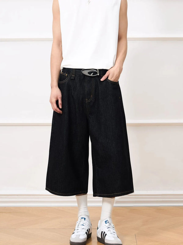 CLOTHRA men wide leg denim shorts showing a relaxed baggy streetwear style jean shorts.