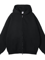 CLOTHRA unisex premium fleece zip-up hoodie showing an oversized fit and cozy streetwear style with front zipper. in a color Black