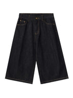 CLOTHRA men wide leg denim shorts showing a relaxed baggy streetwear style jean shorts. in color Black