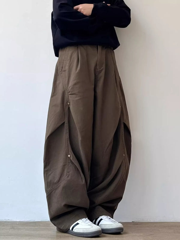 Detailed close up of the spacious side cargo utility pocket with durable dual stitching on CLOTHRA plus size loose pants.