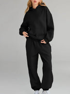 CLOTHRA plus size matching pullover hoodie with front kangaroo pocket and tapered joggers two piece sweatsuit tracksuit set in a clean urban look. in a color Black
