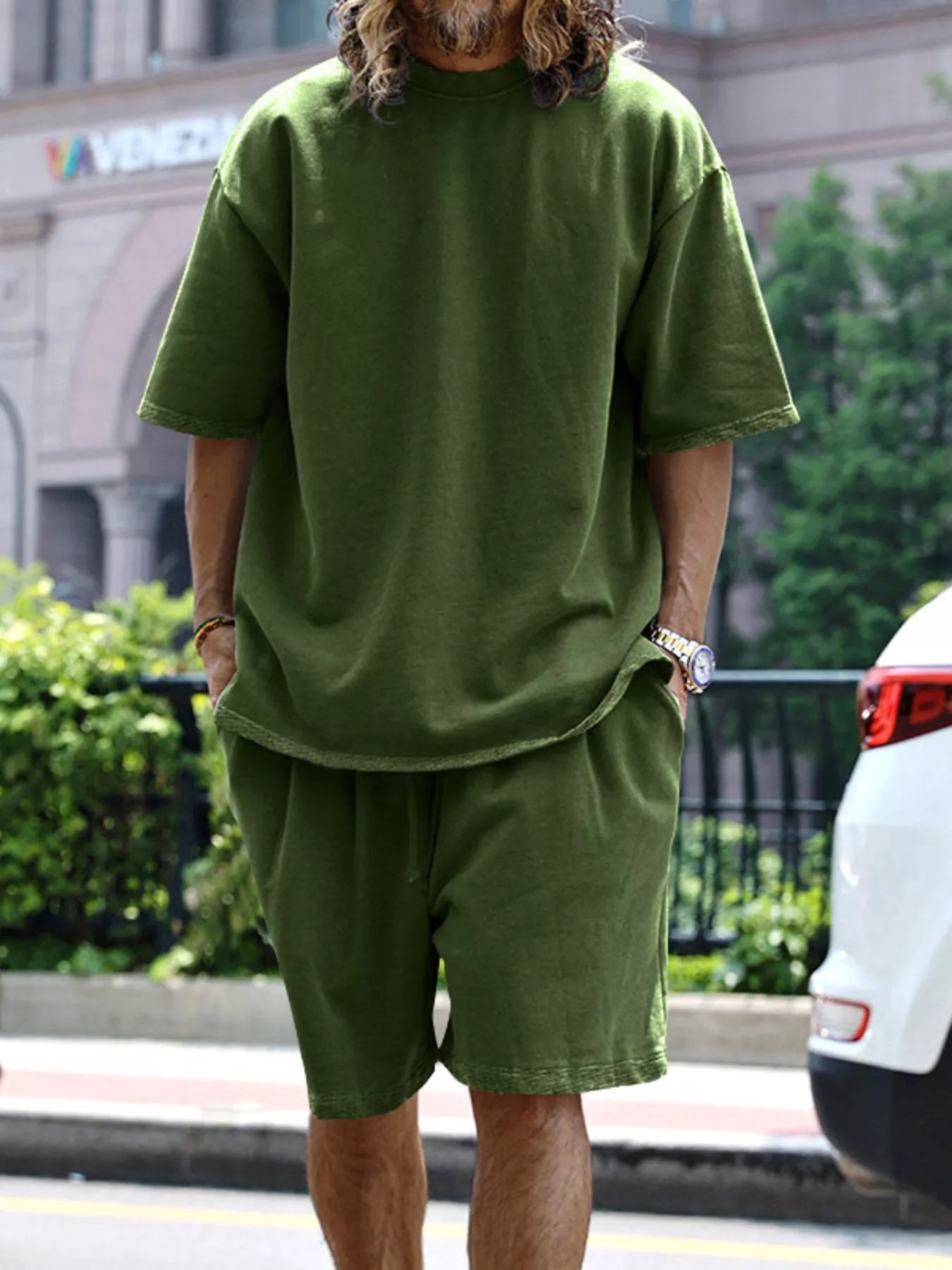 Close up of the deep reinforced side pocket and flexible wide elastic waistband on CLOTHRA plus size matching shorts.