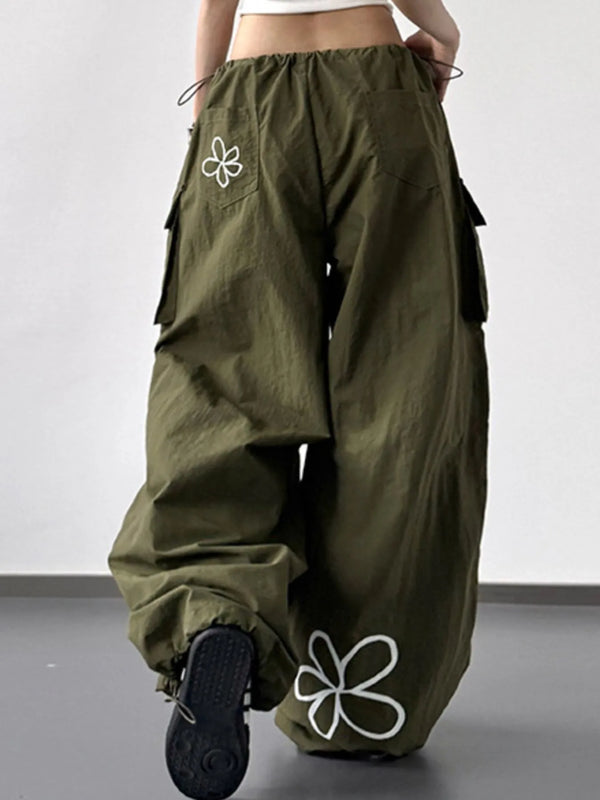 CLOTHRA baggy wide leg utility cargo pants with adjustable drawstring waist and deep multi pocket design. Back view