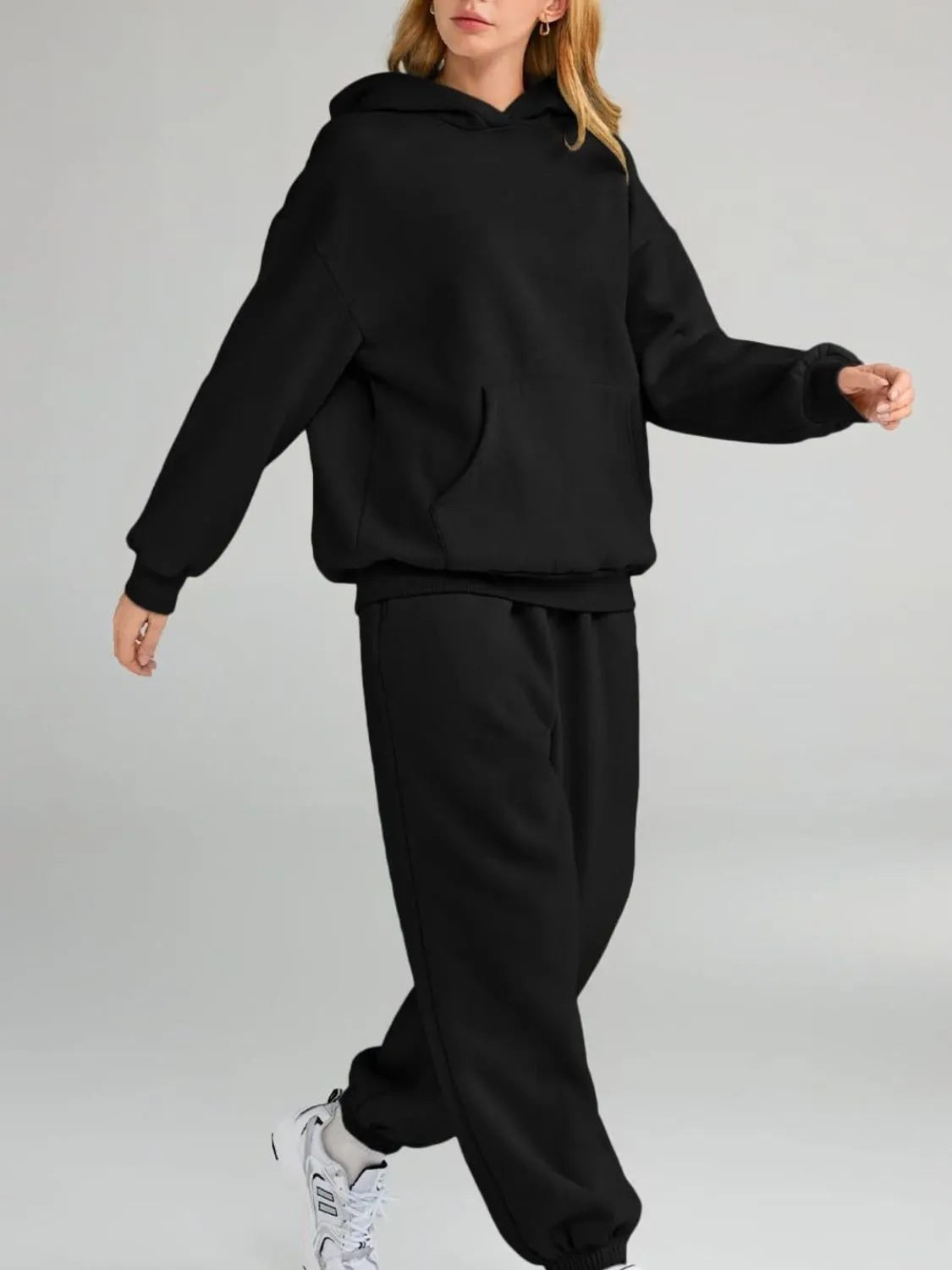 CLOTHRA plus size matching pullover hoodie with front kangaroo pocket and tapered joggers two piece sweatsuit tracksuit set in a clean urban look. Style view