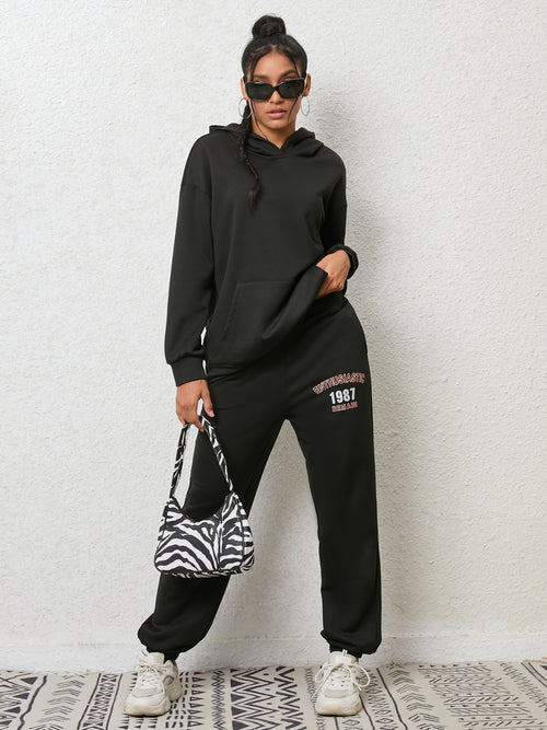 CLOTHRA matching drop shoulder graphic hoodie and cuffed sweatpants two piece streetwear tracksuit set in an oversized urban look.