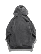 Detailed close up shot of the ultra soft brushed cotton fleece interior lining on CLOTHRA premium cozy hoodie. Back side view in color Grey