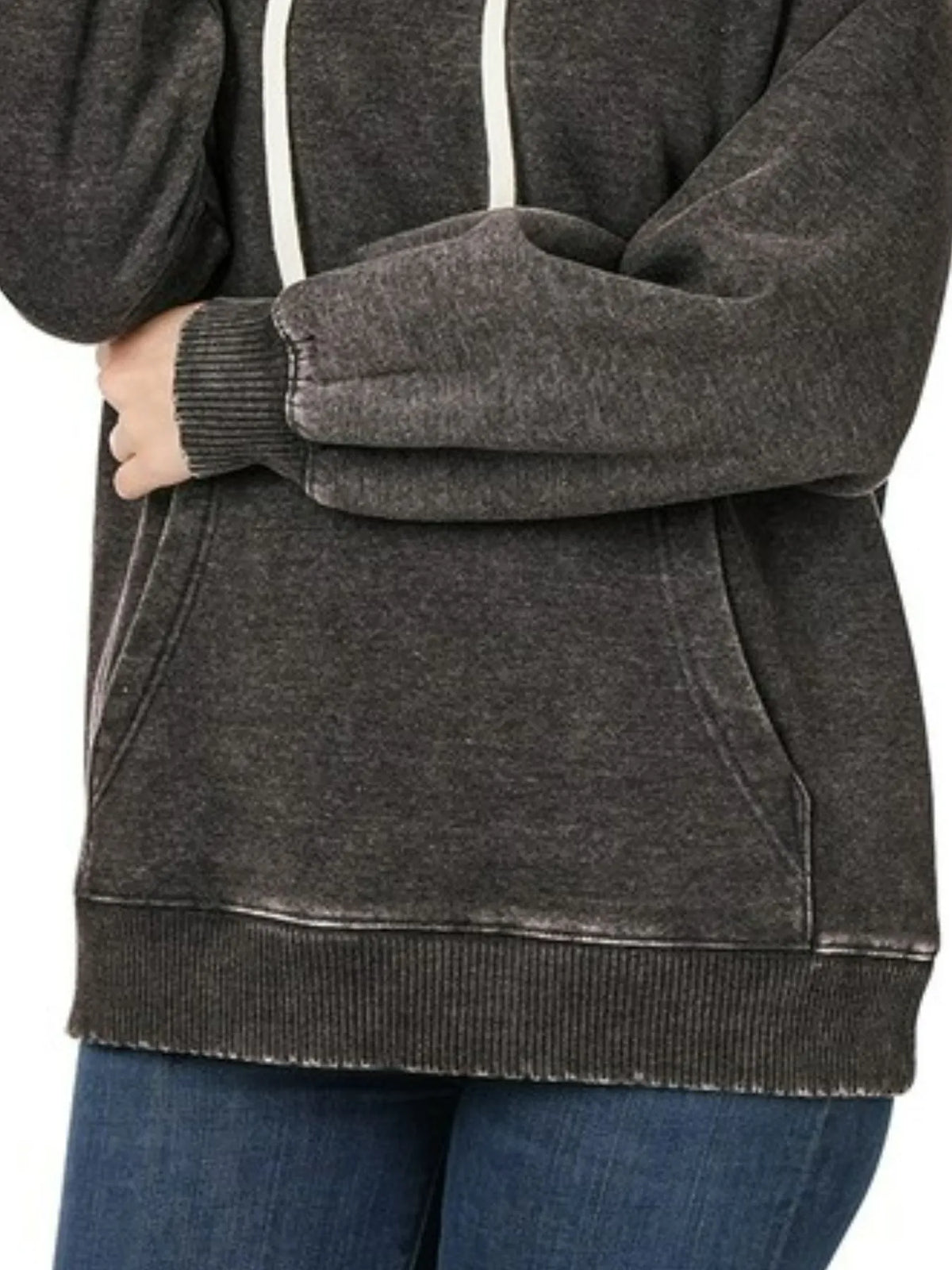 Close up shot of the cloud soft brushed fleece interior lining and secure double stitch cuff borders on CLOTHRA matching hoodie.