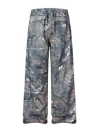 CLOTHRA men camouflage cargo pants showing a relaxed modern utility fit and high contrast military tactical print styling. Back side view