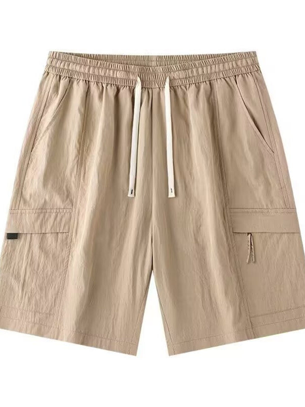 Close up of the extra wide elastic waistband and heavy duty front drawstring on CLOTHRA men plus size relaxed shorts. in a color Khaki