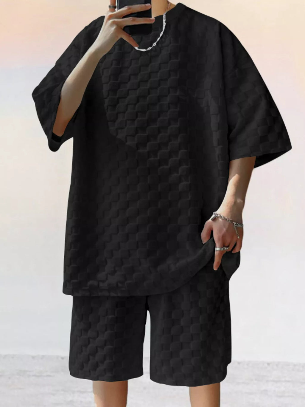 CLOTHRA men plus size matching two piece textured t-shirt and shorts set showing a structured boxy fit and premium casual resort style drape. in a color Black