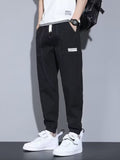 CLOTHRA men plus size casual loose fit denim look knit joggers showing a relaxed tapered streetwear silhouette with pockets. in a color Black