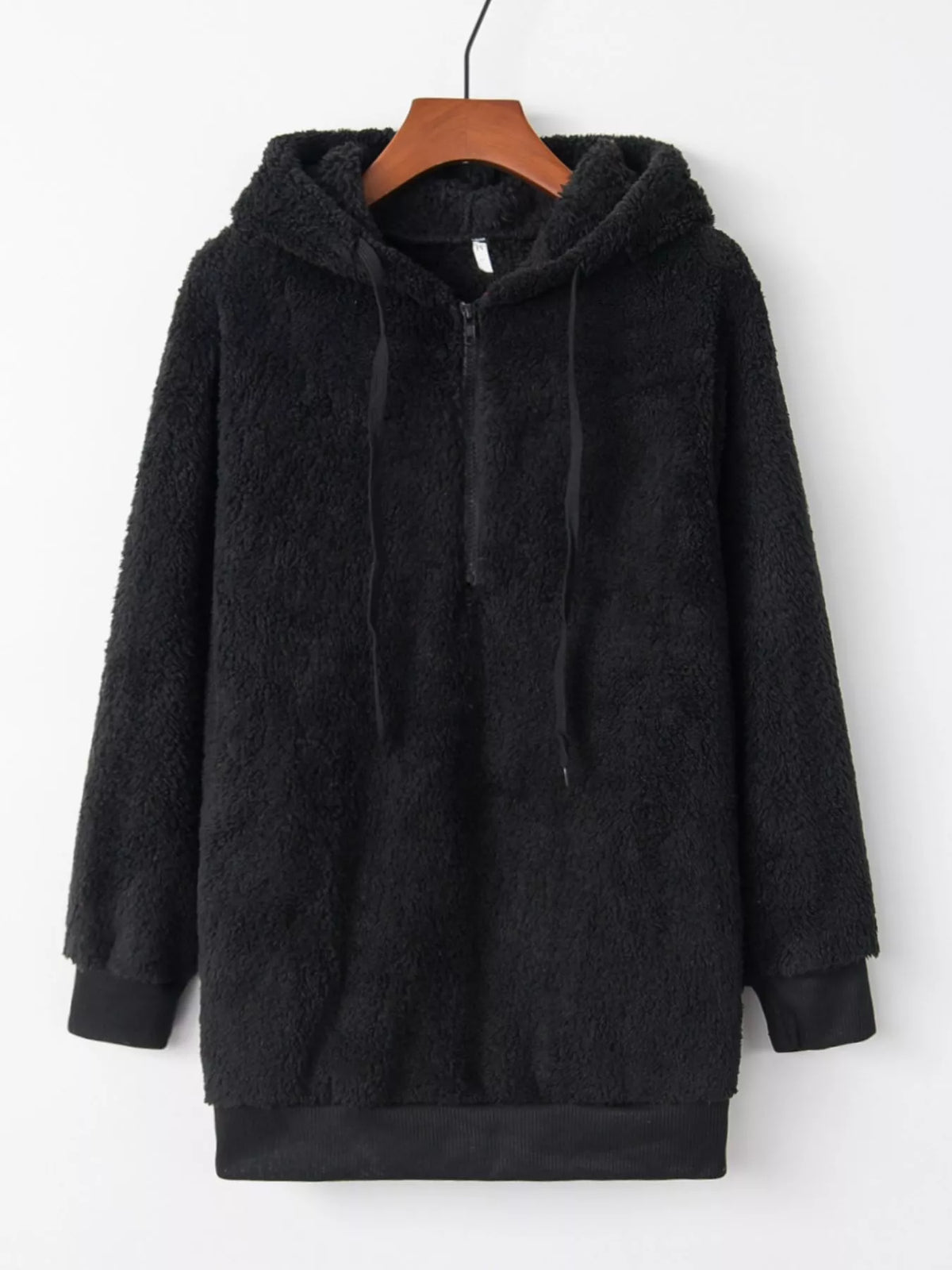 Close up of the high-quality front half zipper and thick adjustable hood drawstrings on CLOTHRA unisex fleece pullover. in a color Black