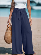 CLOTHRA full size plus size wide leg drawstring pants showing an elongated relaxed vertical drape in an authentic street fashion look.in a color navy Blue