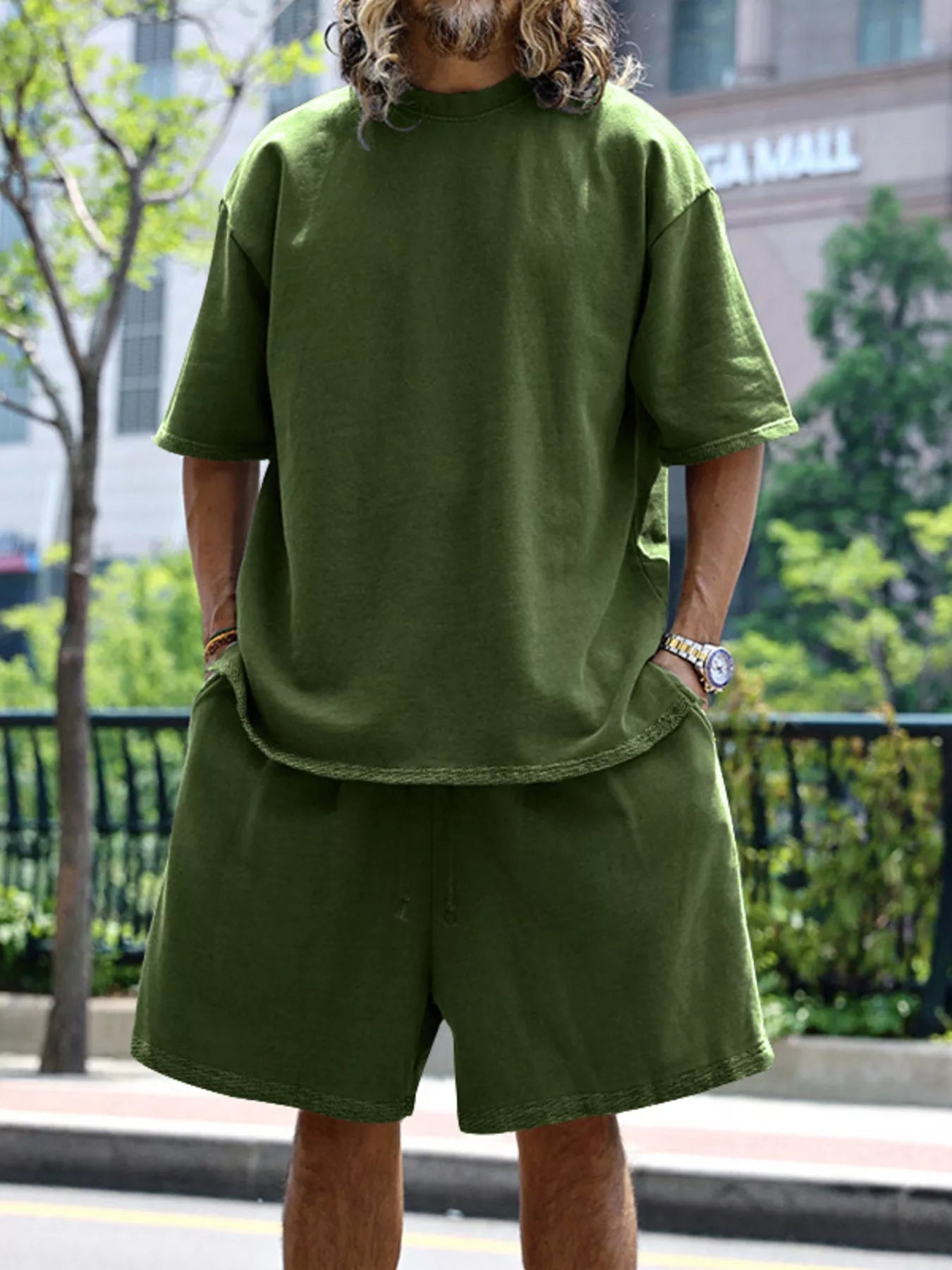 CLOTHRA men plus size matching two piece t-shirt and shorts set showing a relaxed modern casual fit and premium loungewear drape. in a color Army Green
