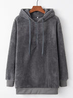 Close up of the high-quality front half zipper and thick adjustable hood drawstrings on CLOTHRA unisex fleece pullover.