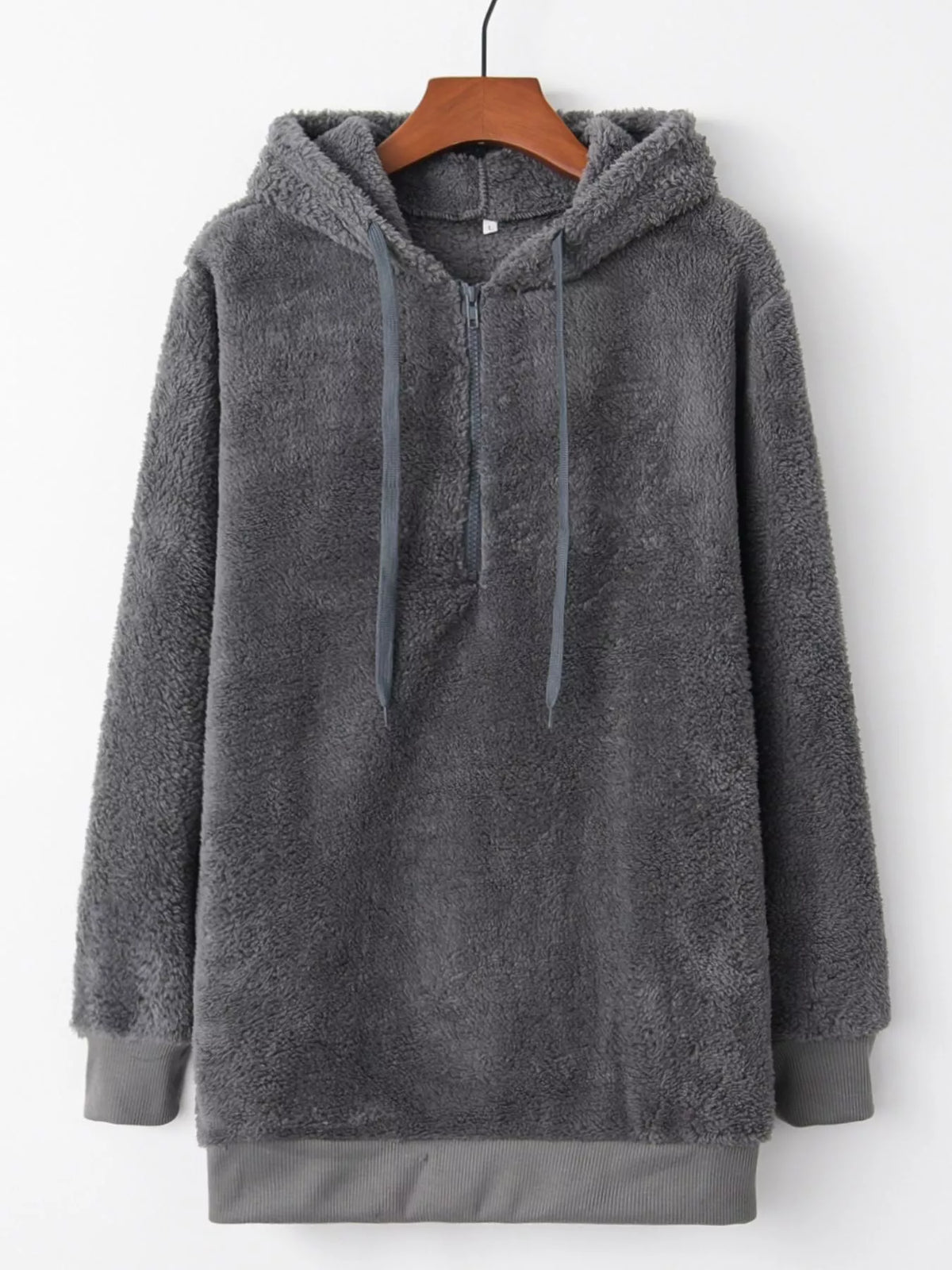 Close up of the high-quality front half zipper and thick adjustable hood drawstrings on CLOTHRA unisex fleece pullover.
