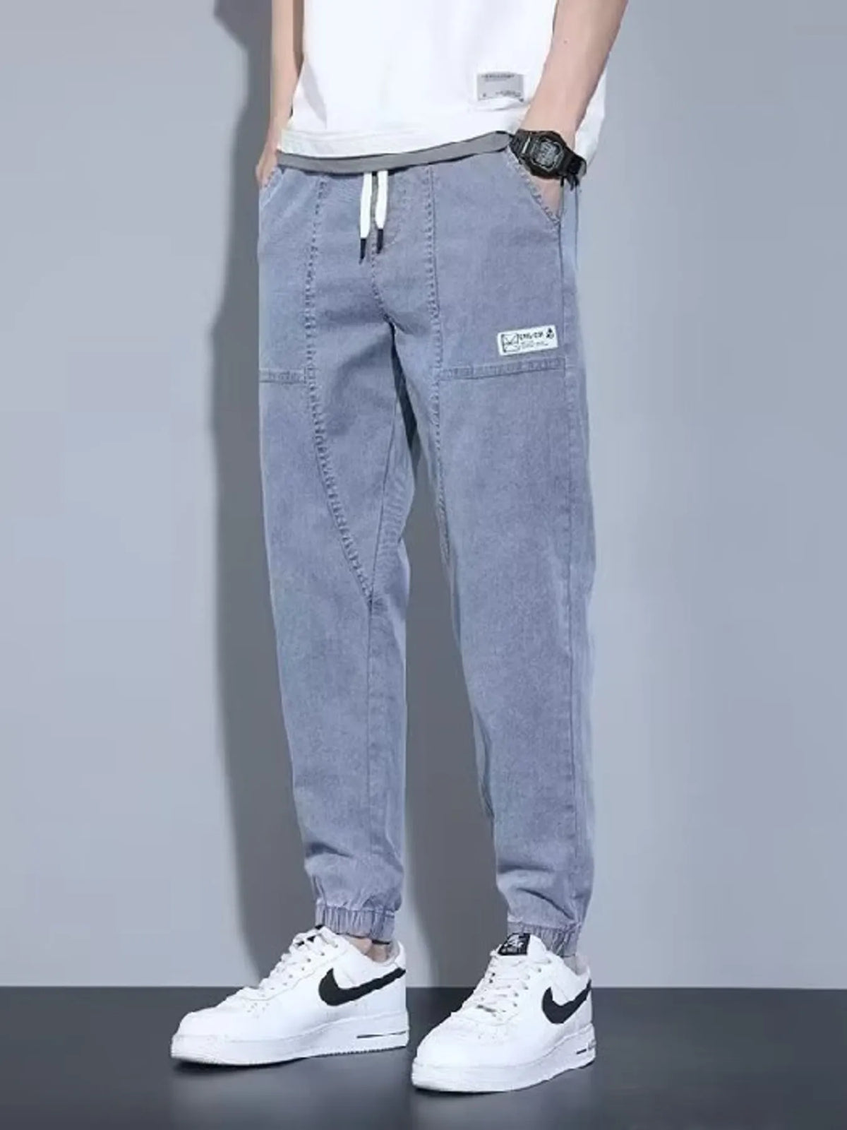 CLOTHRA men plus size casual loose fit denim look knit joggers showing a relaxed tapered streetwear silhouette with pockets. in a color Blue