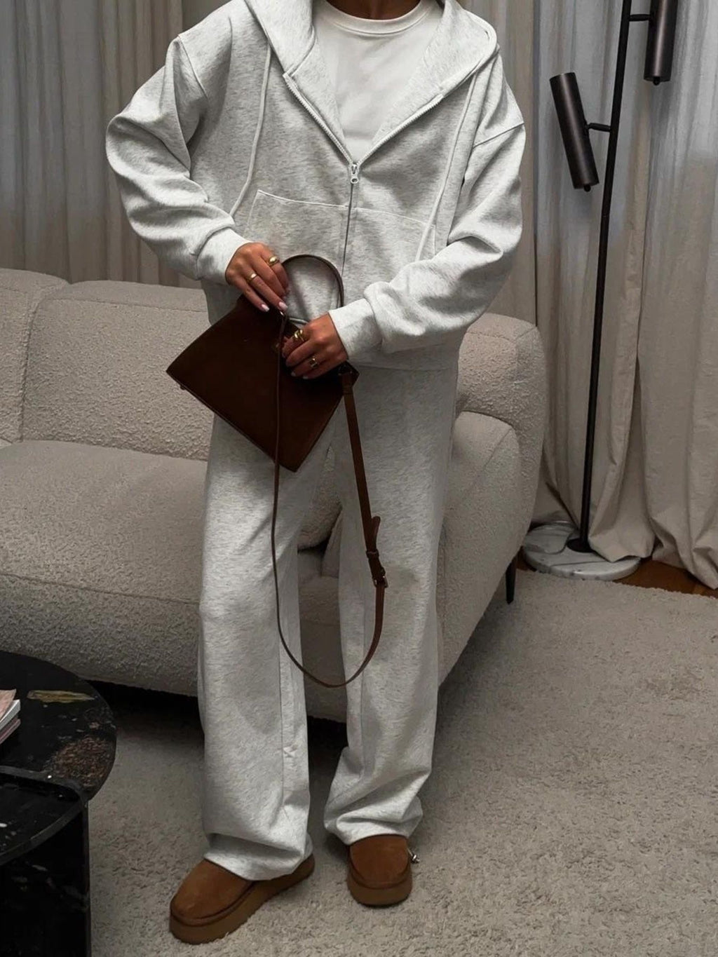 CLOTHRA matching full zip up hoodie and cuffed sweatpants two piece premium cotton tracksuit set in a relaxed urban look. Style view