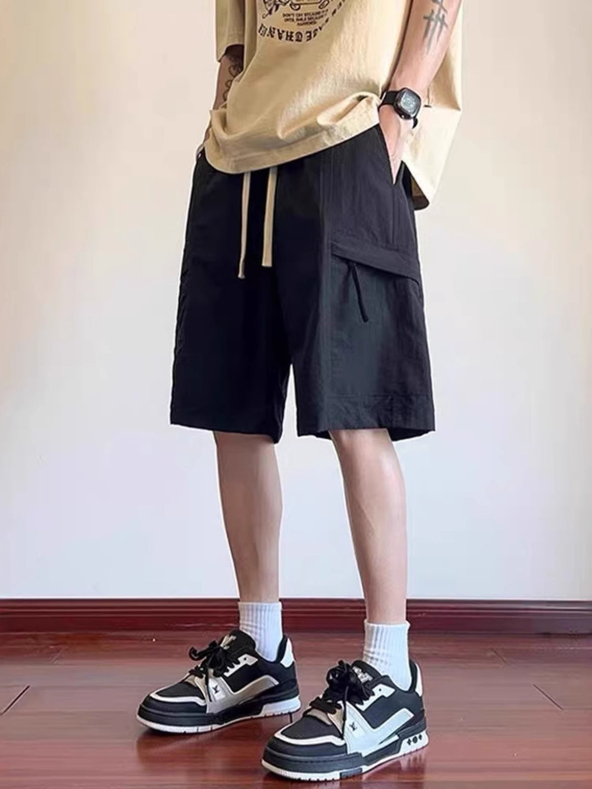 CLOTHRA men plus size lightweight breathable cargo shorts showing a comfortable relaxed fit streetwear style. in a color Black