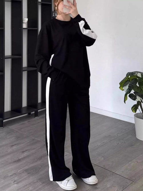CLOTHRA plus size matching contrast round neck top and relaxed pants two piece color block tracksuit set in a clean urban look.