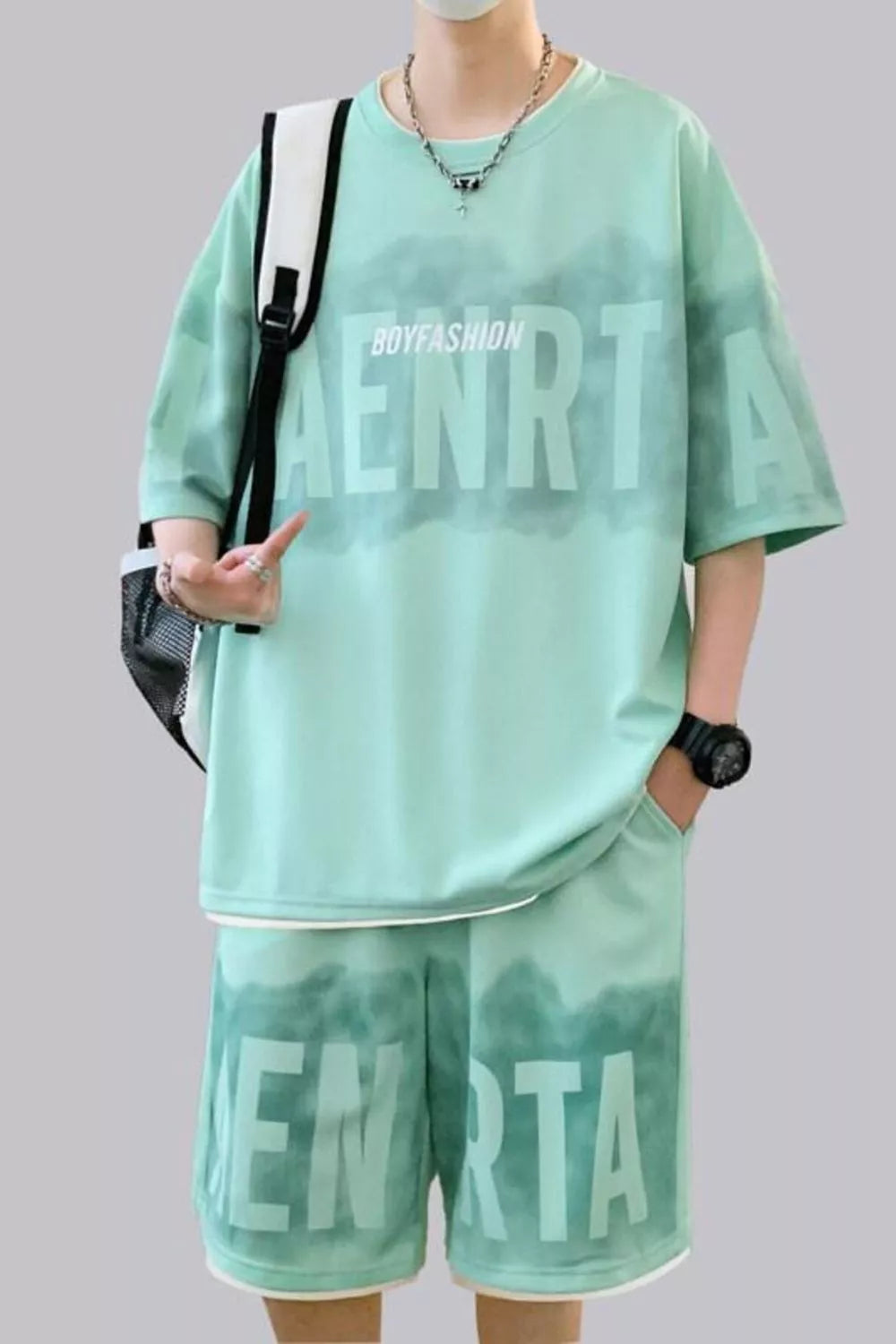 CLOTHRA men plus size oversized matching two piece t-shirt and shorts set showing a relaxed drop shoulder fit and urban streetwear style. in a color Light Green